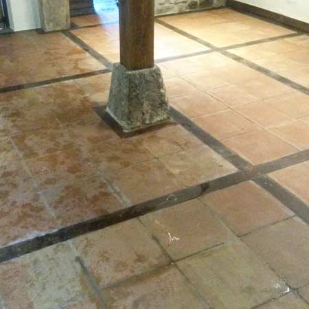 Limpieza y recuperación de superficie de pizarra negra en Somo Boo (Cantabría).